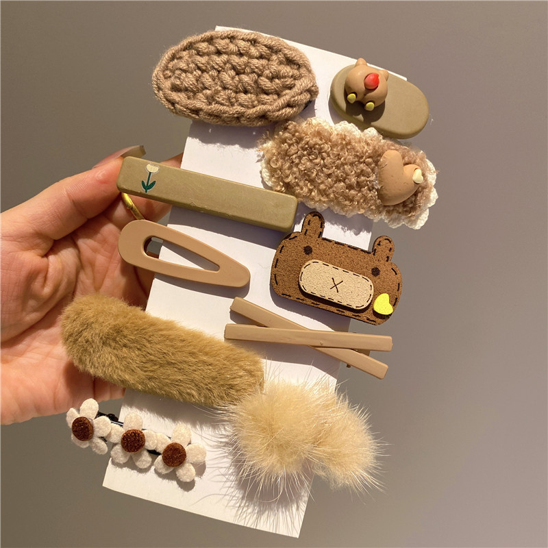 کش مو پارچه‌ای یا پلاستیکی؟ کدام بهتر است؟